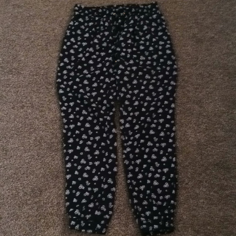Flower detailed black and white silk pants